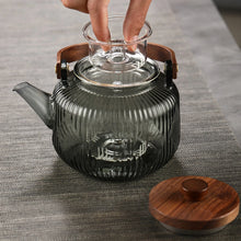 Load image into Gallery viewer, 800ml Glass Teapot With Bamboo Handle Steaming
