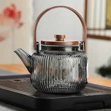 Load image into Gallery viewer, 800ml Glass Teapot With Bamboo Handle Steaming
